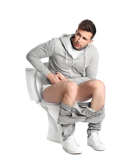 Man Sitting On Toilet Pictures