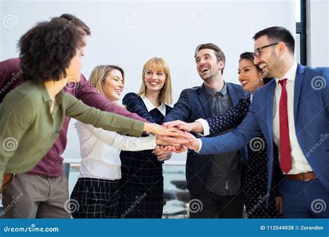 Business Team Joining Hands Together Stock Photo Image Of Happiness