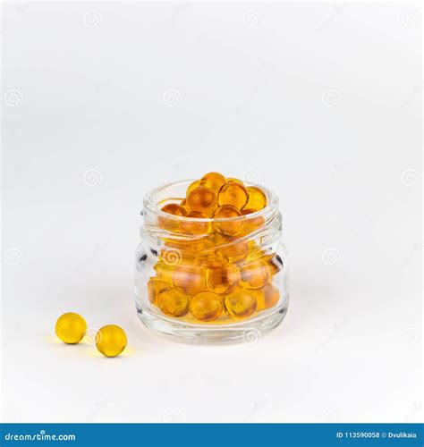 Red And Orange Vitamins Pills Royalty Free Stock Photography