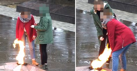 girls caught spitting on war memorial and larking around at sacred site metro news