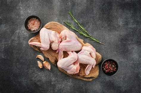 Premium Photo Uncooked Chicken Wings With Spices Raw Meat Raw Chicken