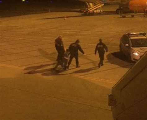 drunken easyjet passenger tried to open emergency door on flight daily mail online