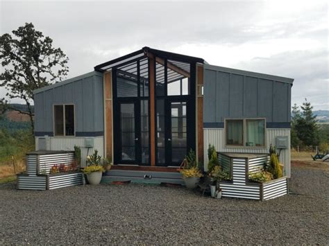 Ingenious Design Sees Two Tiny Homes Connected By A Light Filled Sunroom