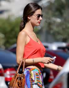 Alessandra Ambrosio Flashes Peek At Her Toned Tummy As She Heads To Day