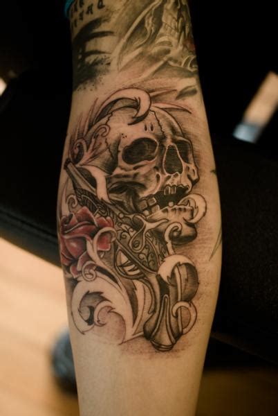Sugar skull tattoo with guns. Arm Skull Gun Tattoo by GZ Tattoo