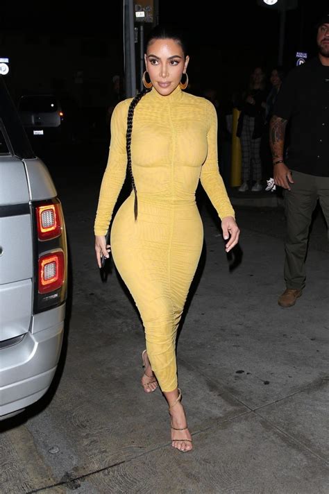 kim kardashian shows her famous curves in a skintight dress the fappening