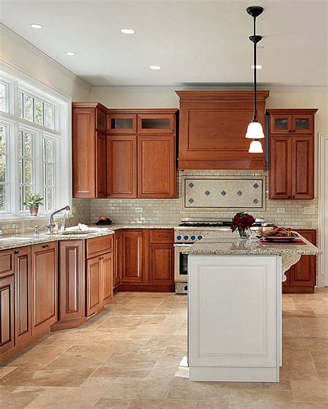 A Large Kitchen With Wooden Cabinets And Marble Counter Tops Along