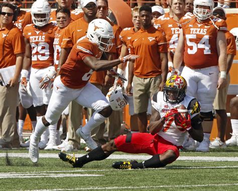 NCAA FOOTBALL: Maryland upsets No. 23 Texas 51-41, spoils Herman's debut