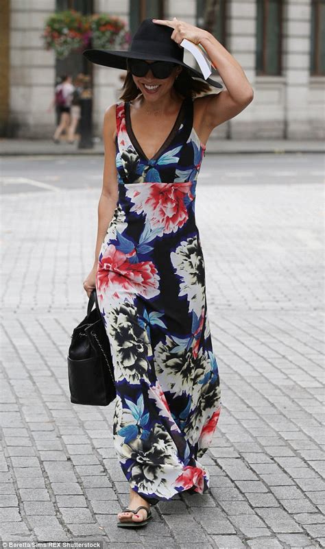 Myleene Klass Wears Maxi Dress With A Wide Hat And Ditches Heels
