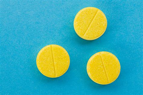 Best Small Yellow Pill Stock Photos Pictures And Royalty Free Images