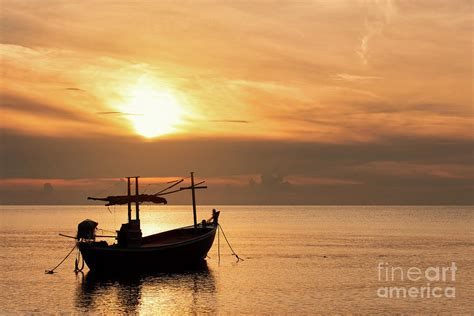 Sunset Over The Sea With Fishing Boat Beautiful Nature Backgro