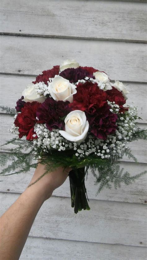 Rich Colored Bridal Bouquet Of Burgundy And Deep Purple Carnations