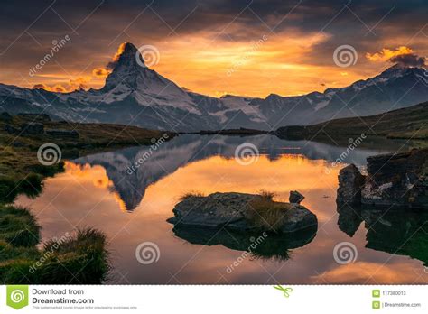 Reflection Of Matterhorn In Mountain Lake At Sunset Stock Image Image