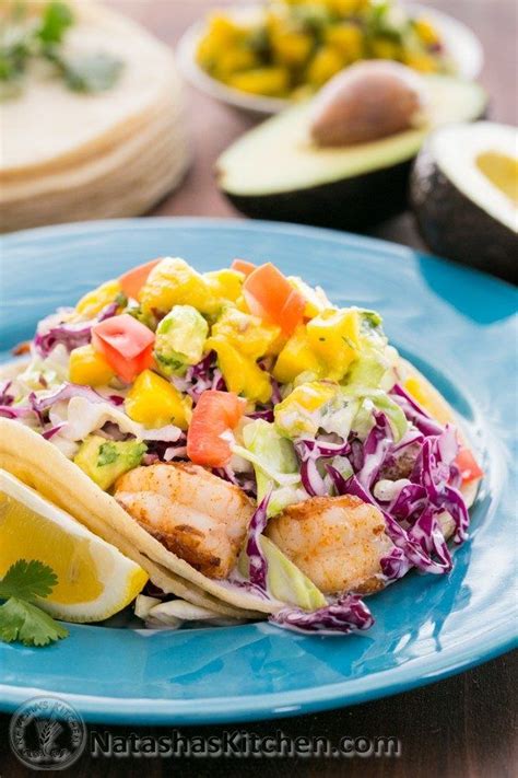 These grilled fish tacos are coated with a chile rub for a punch of flavor. These Shrimp Tacos with Coconut Coleslaw & Mango Salsa are ...