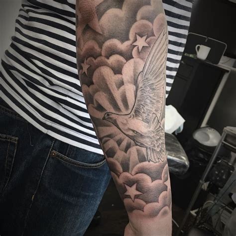 If you get the whole effect well done, it is a great tattoo design. Cloud tattoo - The tattoo appears nationalistic. The exact ...