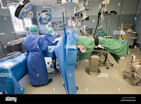 Surgeon During A Head Operation Neurosurgery Operating Room Stock