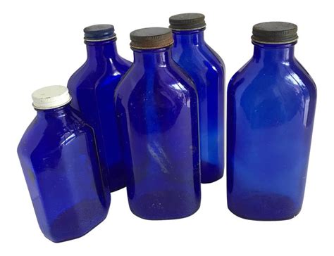 Vintage Blue Glass Medicine Bottles Set Of Five On Blue Glass Jar Blue Glass