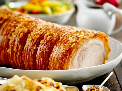 Cut slits in top of roast; Roasted pork loin with crackling and creamy potato bake ...