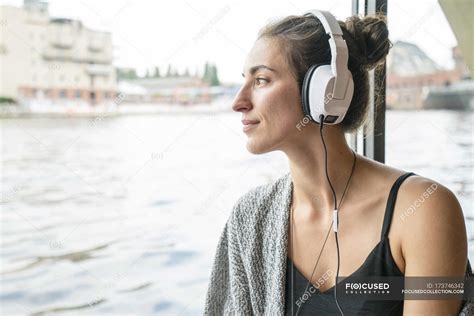 Relaxed Woman Listening Music With Headphones — Outdoor Focus On