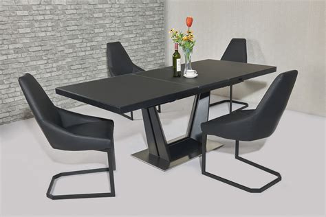 Maybe you would like to learn more about one of these? Matt black glass dining table and 8 black chairs - Homegenies