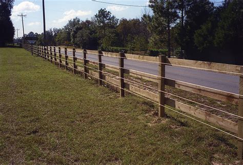 Neither posts nor rails can be seen on the outside of this fence. What Are the Best Horse Fencing Options