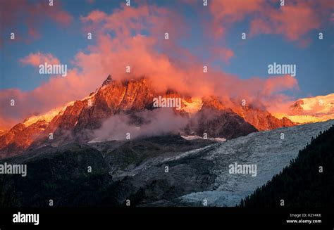 Mont Blanc Mountain Range Glowing In Dramatic Light With A View On A