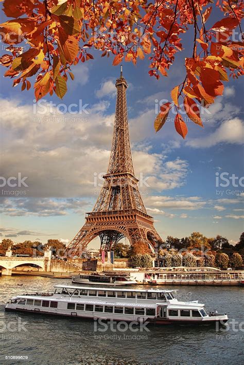 Eiffel Tower With Boats On Seine In Paris France Stock Photo Download