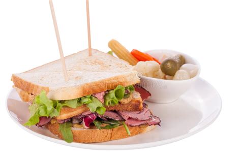 To reheat, thinly slice and set over a steamer, or. Delicious Pastrami Club Sandwich And Pickles Stock Image ...