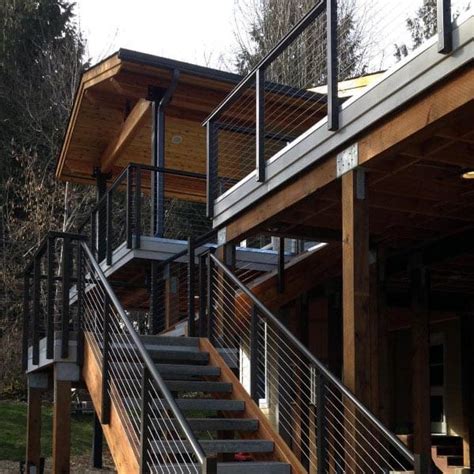 Here we have an attractive designing of the staircase for you. Top 50 Best Metal Deck Railing Ideas - Backyard Designs