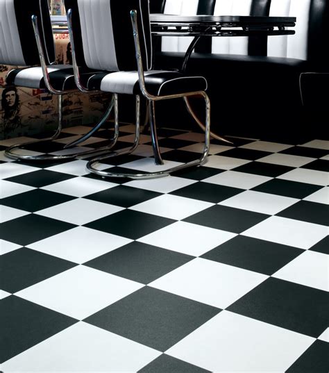 Plus, white stone tiles are available in a variety of price points as well, making them easy to fit into any budget. Black and White Vinyl tiles from Safety Flooring UK
