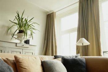 Hanging the curtain rods is the most difficult part, but once installed the rest is quite easy and fast. Hanging Curtains From the Ceiling vs. a Window | Home ...