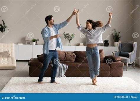 Full Length Loving Young Couple Dancing In Living Room Together Stock Image Image Of Person