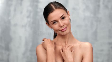 Seductive Naked Beautiful Female Touching Face Neck Shoulder Smooth Skin Posing Looking At