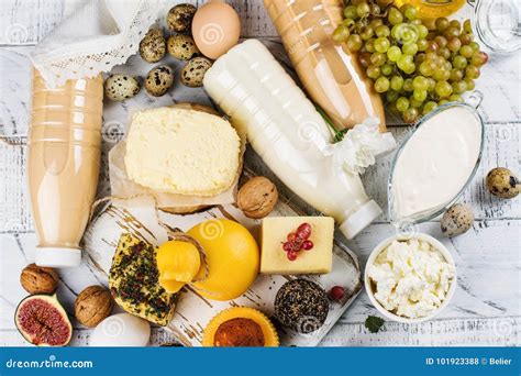 Assortment Of Dairy Farm Products On Wooden Table Stock Photo Image