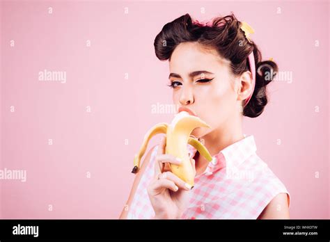 Pretty Girl In Vintage Style Retro Woman Eating Banana Pin Up Woman