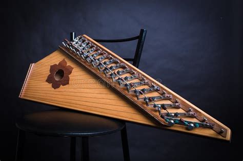 Russian Folk Musical Instruments Gusli Isolated On A Black Background