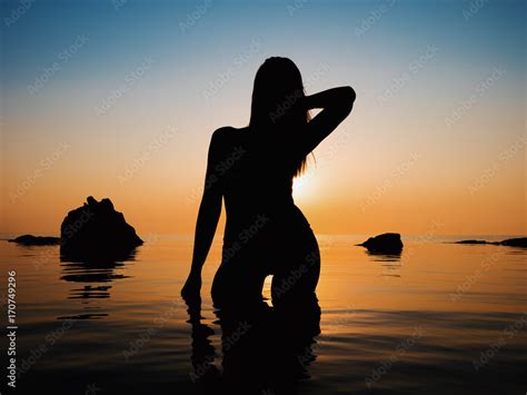 Sunset Sexy Woman Silhouette Vacation Sillhouette Of Traveling Girl In Bikini Standing In Sea