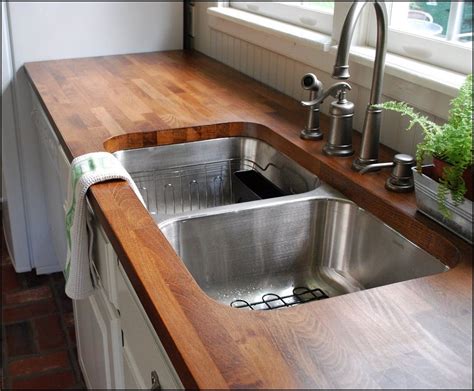 Instead of going for the tried and true granite, or laminate material many however, wood can also be used as kitchen countertops, and can add a different look and feel to your kitchen. Image result for wood countertops lowes | Bathroom ...