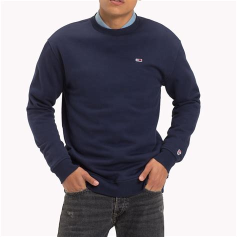 Used , i'm selling it because i'm changing my wardrobe. Sweat Tommy Hilfiger Jeans pour homme molleton bleu marine