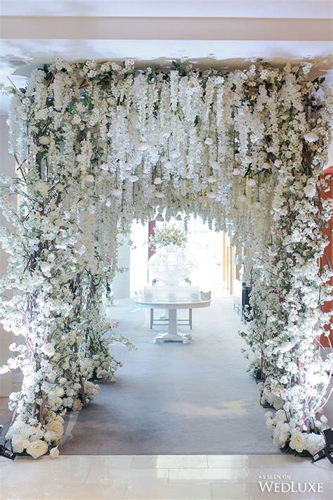 A White Wisteria And Silver Sparkle Dream Wedding Entrance Ceremony
