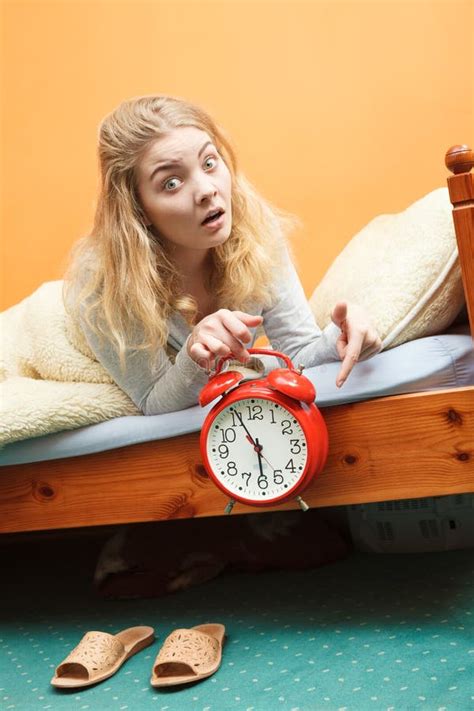 Unhappy Woman Waking Up With Alarm Clock Stock Photo Image Of