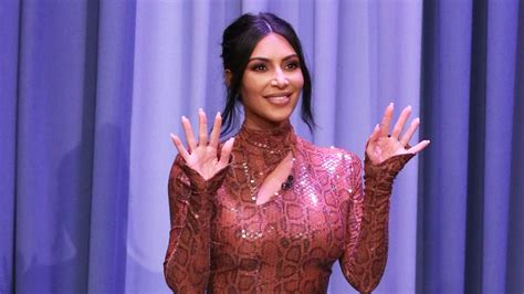 Kim Kardashian Just Debuted Bright Red Hair And We Have So Many Questions Allure