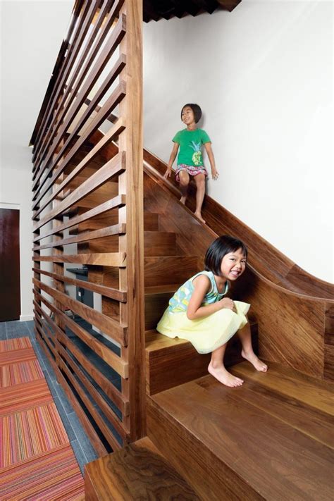 7 Cool Buildings With Stair Slides And Happy Kids