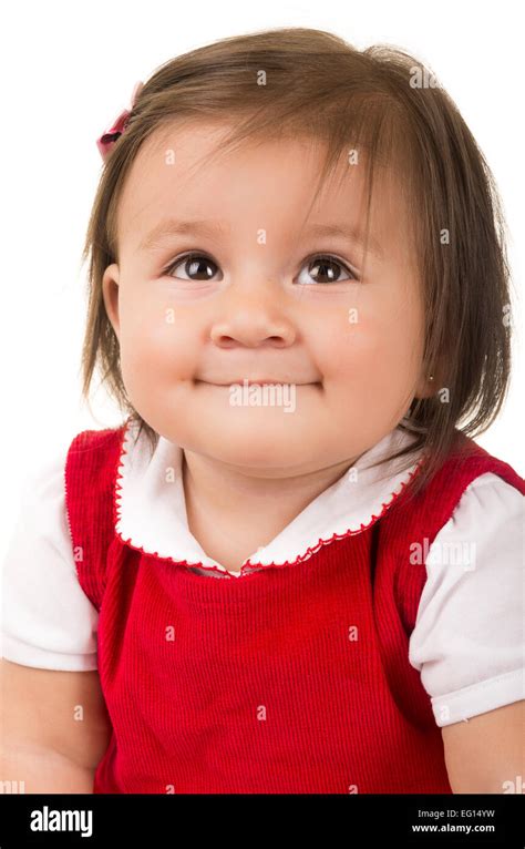 Portrait Of Adorable Brunette Baby Girl Wearing Red Dress Stock Photo