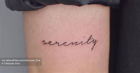 Serenity Lettering Tattoo On The Tricep
