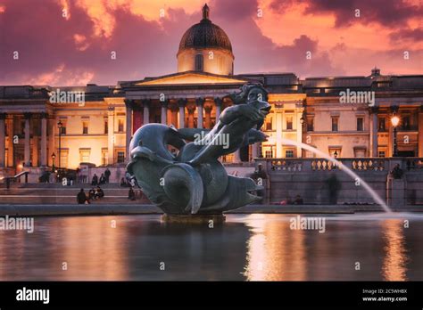 Fountain At Trafalgar Square And The National Gallery In London