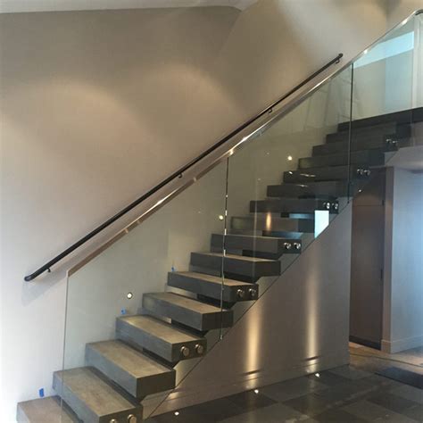 It's complied with building code requirements. Standoff bracket frameless tempered glass railing