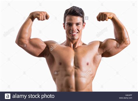 Portrait Of A Muscular Young Man Flexing Muscles Stock