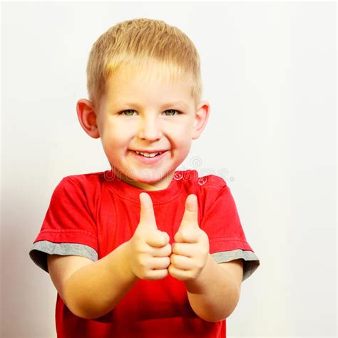 Little Boy Showing Thumb Up Success Hand Sign Gesture Stock Image