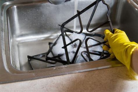Grates should be washed regularly in hot soapy water, rinsed in clean water and dried before placing them back on the range. How to Clean the Cast-Iron Grates on a Gas Range | Clean ...